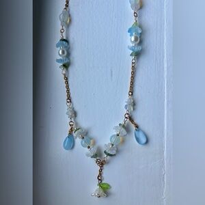 Crystal Blue and Gold Necklace with Floral Accents